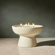 Close-up of MELTIQUE Pearl Sand Wax granules with pearly smooth finish for candles